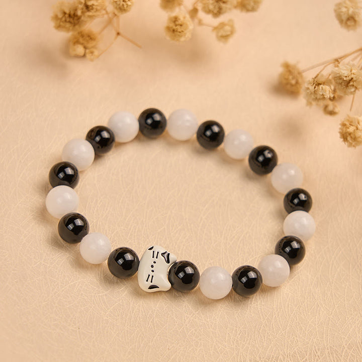 Bracelet porte-bonheur en Buddha Stones, chat bicolore, onyx noir, calcédoine blanche - image 2