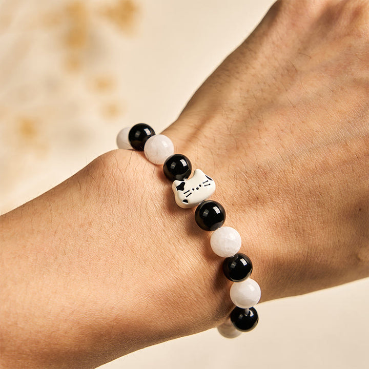 Bracelet porte-bonheur en Buddha Stones, chat bicolore, onyx noir, calcédoine blanche - image 5