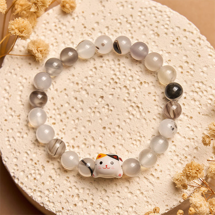 Bracelet de puissance en céramique avec tête de chaton en pierre d'agate naturelle et chat Calico de Buddha Stones - image 2