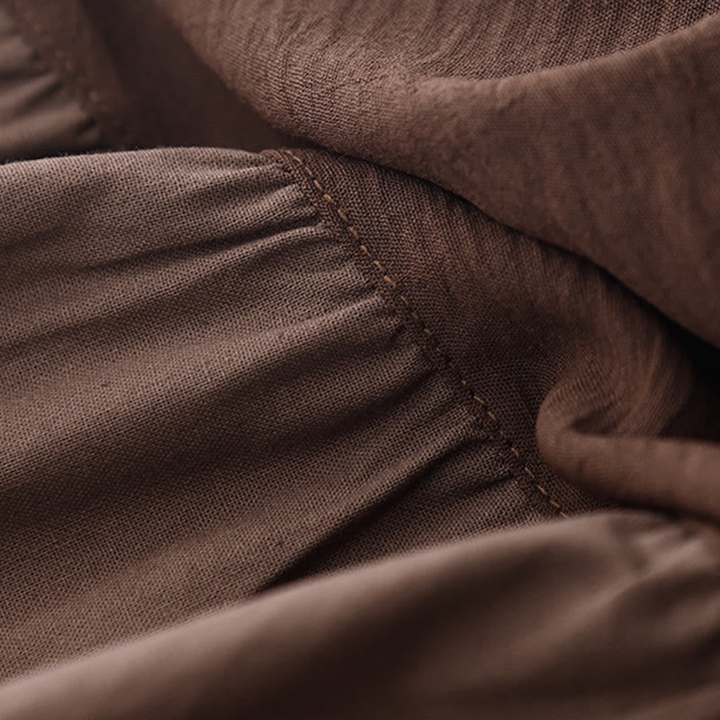 Robe midi à manches longues, col simple et poches, motif Buddha Stones, style printemps - image 2