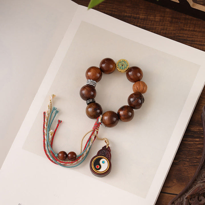 Bracelet porte-bonheur Yin Yang en bois de jujubier frappé par la foudre et Buddha Stones du Tibet - image 9