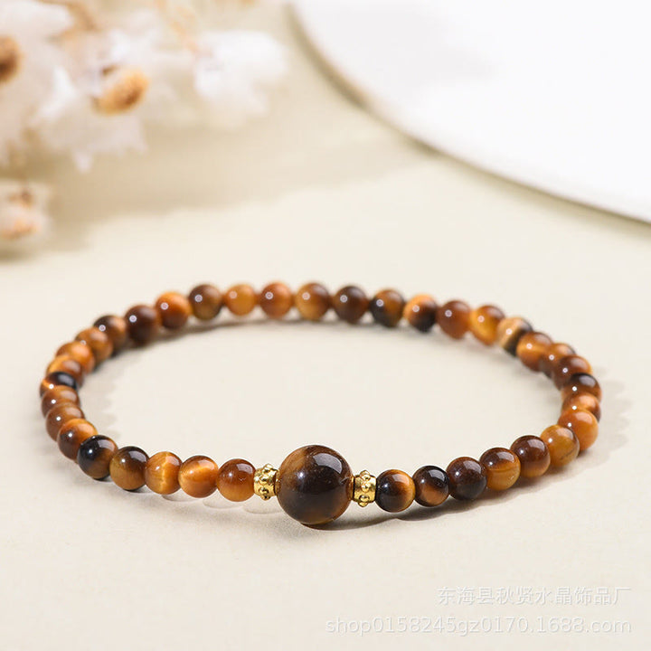 Bracelet de Buddha Stones courageuses en obsidienne noire et œil de tigre - Œil de tigre - 4 mm - image 1