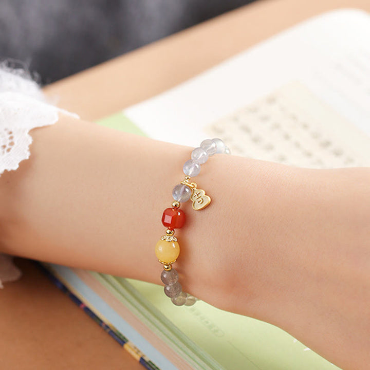Bracelet Charmant Lotus Love en Pierres de Lune Naturelles et Buddha Stones - image 13