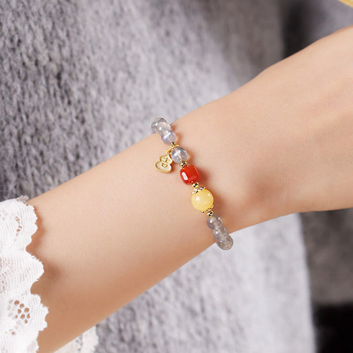 Bracelet Charmant Lotus Love en Pierres de Lune Naturelles et Buddha Stones - image 14