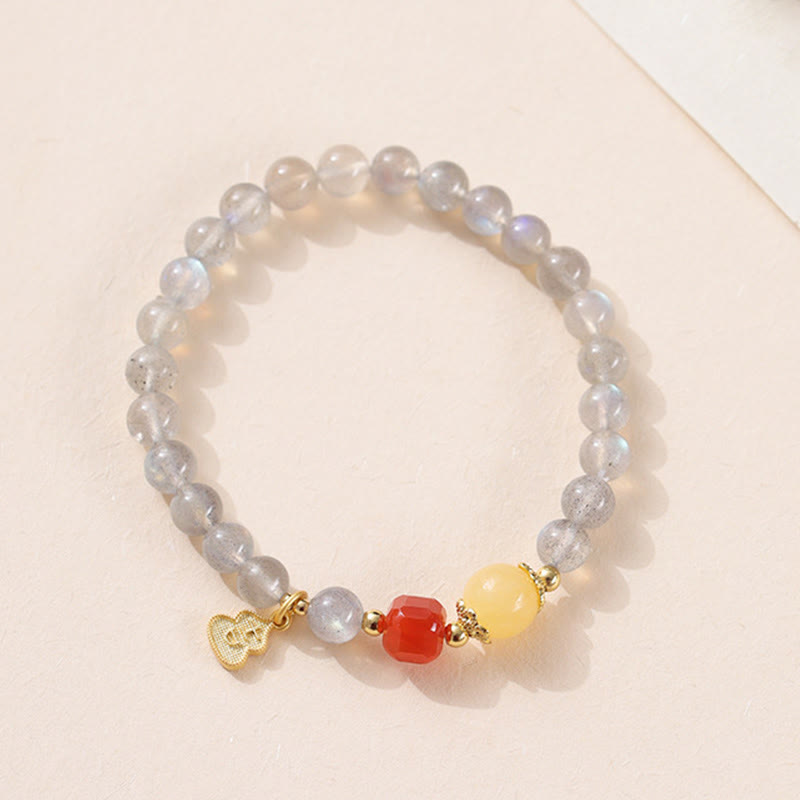 Bracelet Charmant Lotus Love en Pierres de Lune Naturelles et Buddha Stones - image 11