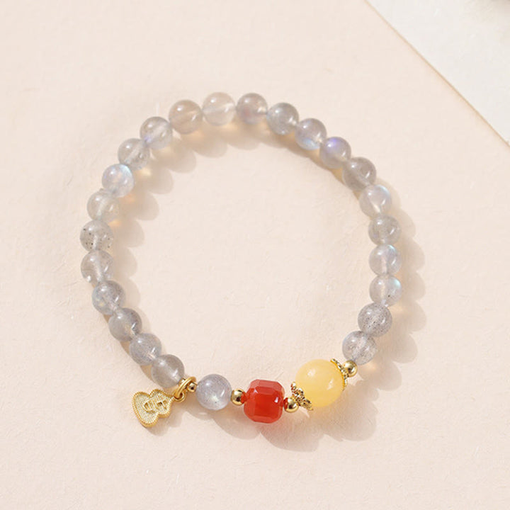 Bracelet Charmant Lotus Love en Pierres de Lune Naturelles et Buddha Stones - image 11