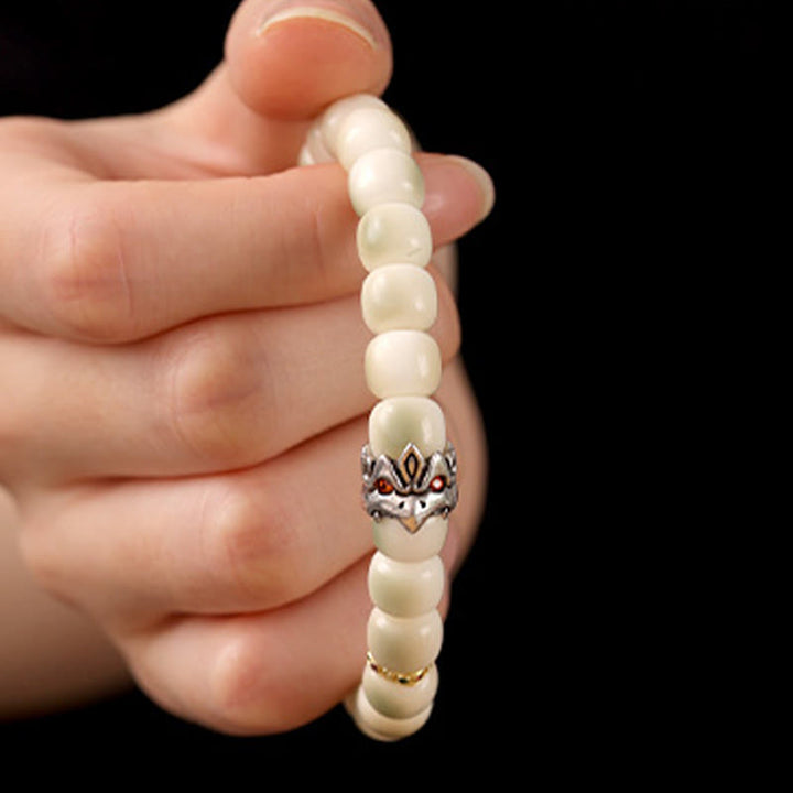 Bracelet de sagesse Garuda en cuivre martelé et graines de Bodhi en Buddha Stones - image 1