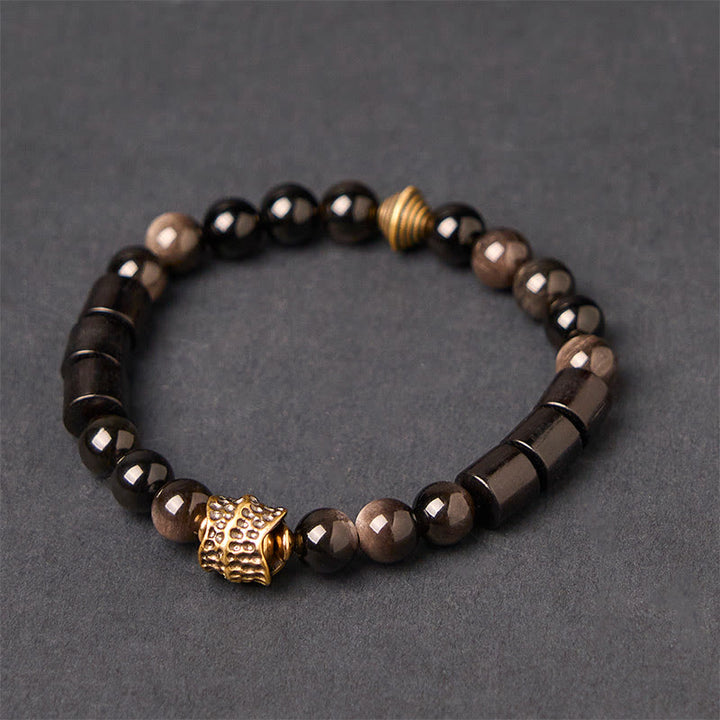 Bracelet de protection en obsidienne et ébène avec Buddha Stones et reflets argentés - Obsidienne argentée et bois d'ébène (tour de poignet : 18-20 cm) - image 0