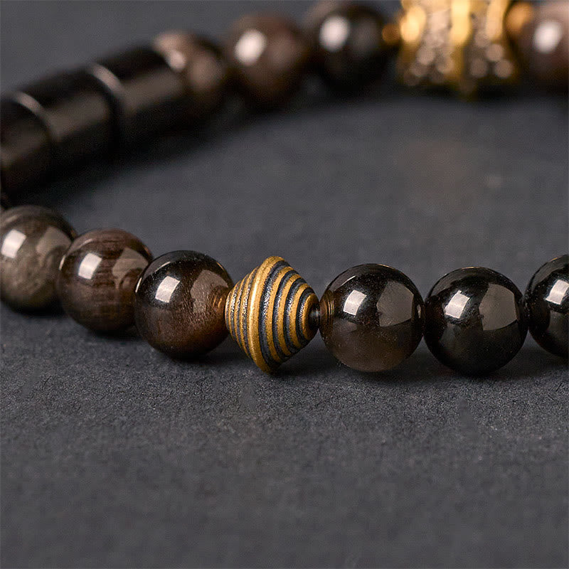 Bracelet de protection en obsidienne et ébène avec Buddha Stones et reflets argentés - image 3