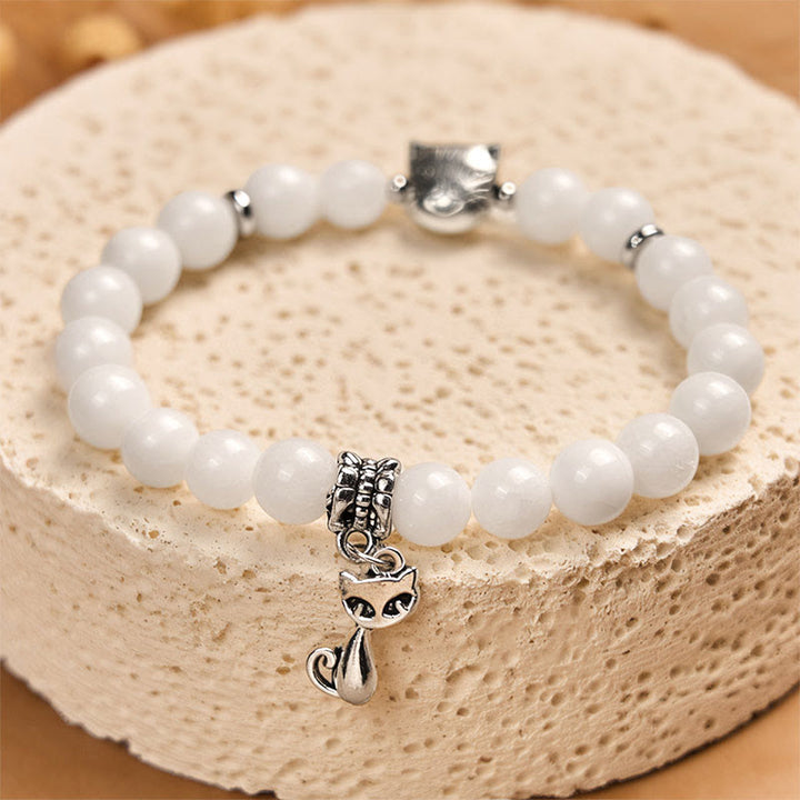 Bracelet positif en perles de calcédoine blanche naturelle avec Buddha Stones et chat blanc - image 3
