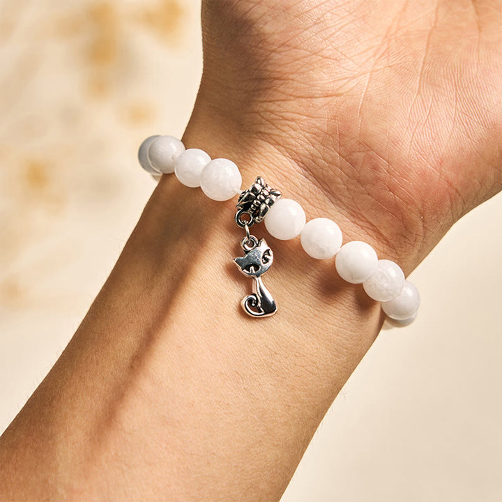 Bracelet positif en perles de calcédoine blanche naturelle avec Buddha Stones et chat blanc - image 4