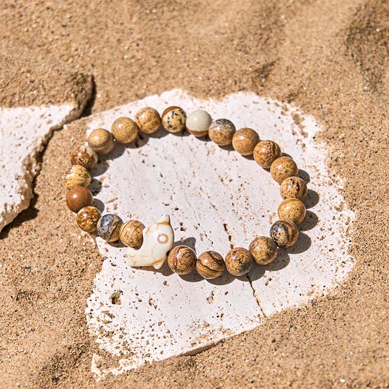 Bracelet d'équilibre spirituel en pierres naturelles de Buddha Stones et dauphin - image 1