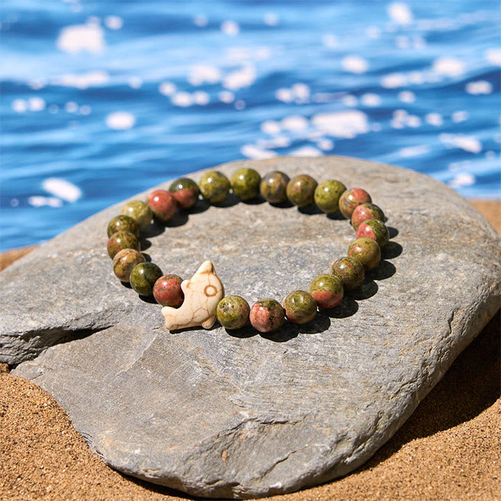 Bracelet d'équilibre spirituel en pierres naturelles de Buddha Stones et dauphin - image 26