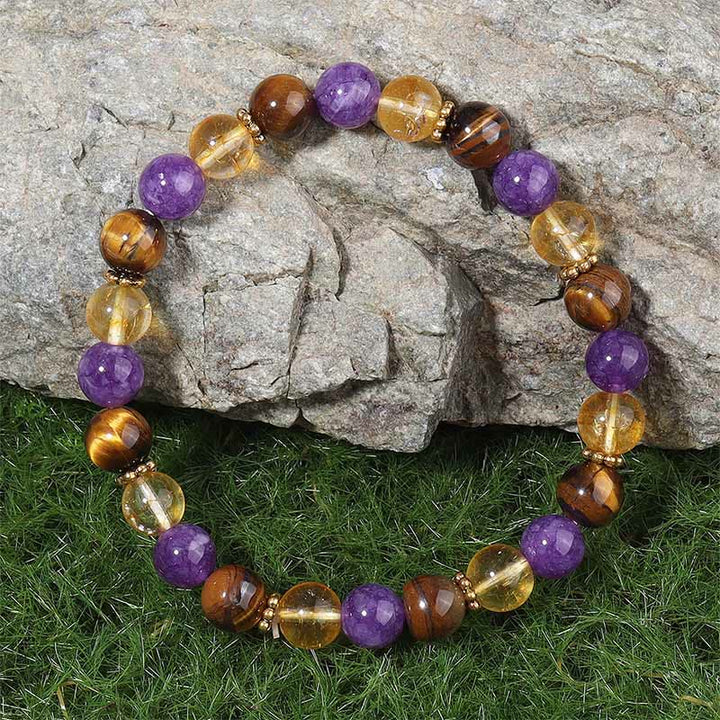 Bracelet de guérison en Buddha Stones d'espacement en améthyste, œil de tigre et citrine - image 1
