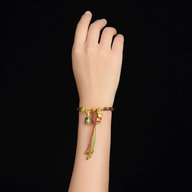 Bracelet tressé coloré en or tibétain avec Buddha Stones et famille de bêtes avaleuses - image 3