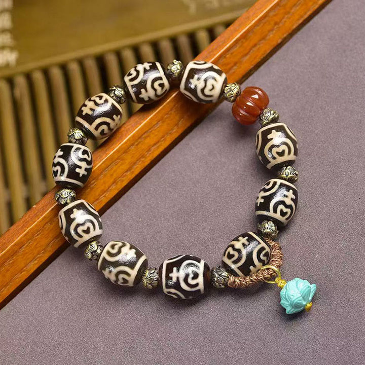 Buddha Stones Vase au trésor de foudre tibétain Perle Dzi Bracelet de puissance du Seigneur de la forêt des cadavres - Perle Dzi Vase Lotus (circonférence du poignet : 16-17 cm) - image 9