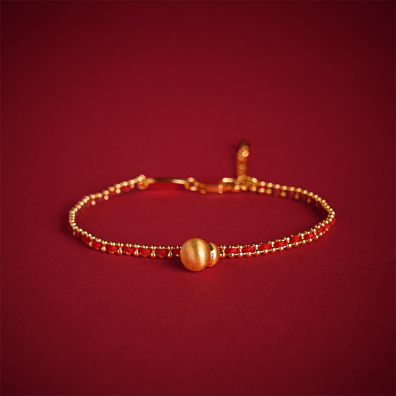 Bracelet de force et de richesse en cuivre et laiton avec Buddha Stones et cordon rouge - image 1