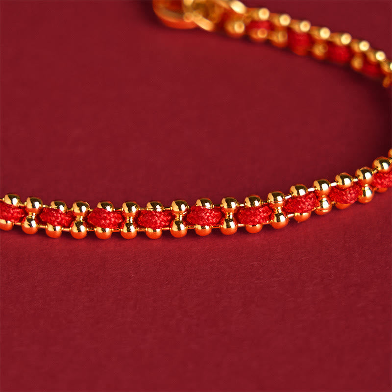 Bracelet de force et de richesse en cuivre et laiton avec Buddha Stones et cordon rouge - image 4