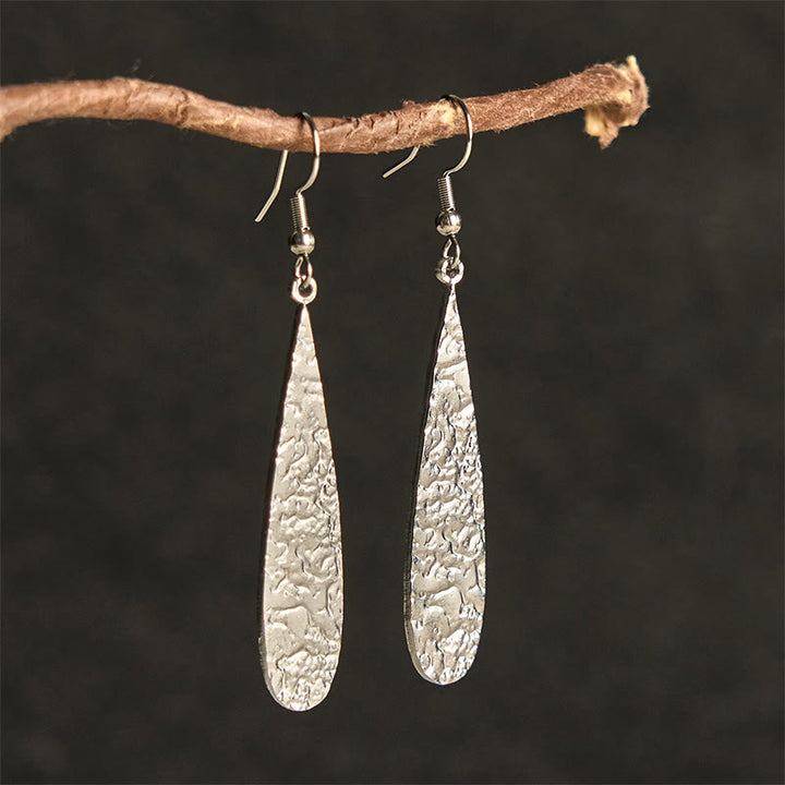 Boucles d'oreilles élégantes en acier titane avec Buddha Stones et marteau d'équilibre - Forme de larme argentée (poteaux en acier titane) - image 2