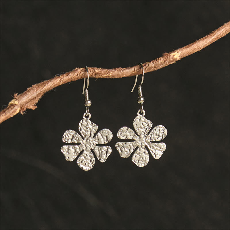Boucles d'oreilles élégantes en acier titane avec Buddha Stones et marteau d'équilibre - Forme de fleur argentée (poteaux en acier titane) - image 8