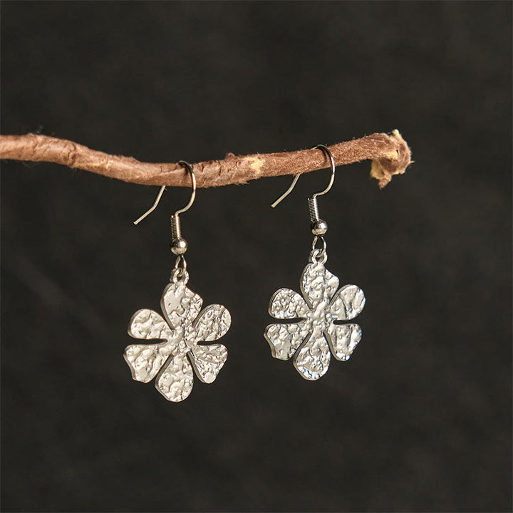 Boucles d'oreilles élégantes en acier titane avec Buddha Stones et marteau d'équilibre - image 9