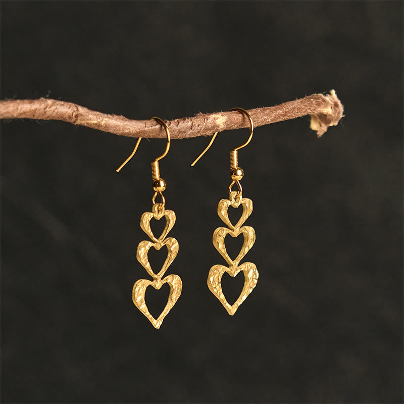 Boucles d'oreilles élégantes en acier titane avec Buddha Stones et marteau d'équilibre - image 12