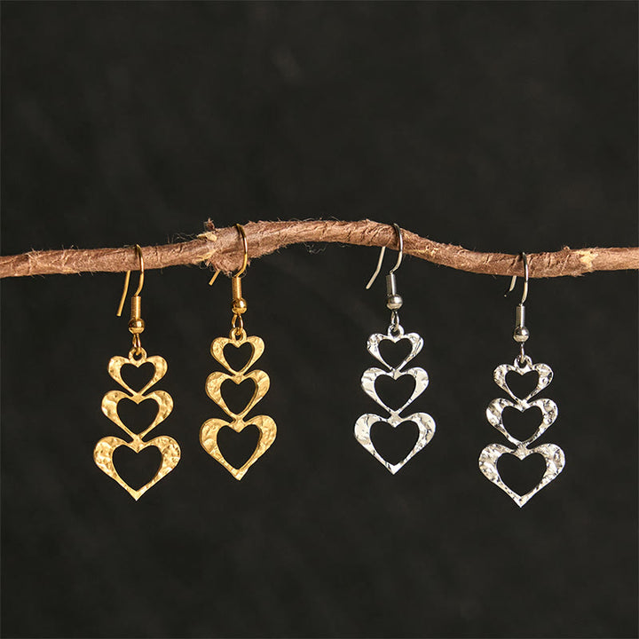 Boucles d'oreilles élégantes en acier titane avec Buddha Stones et marteau d'équilibre - image 15