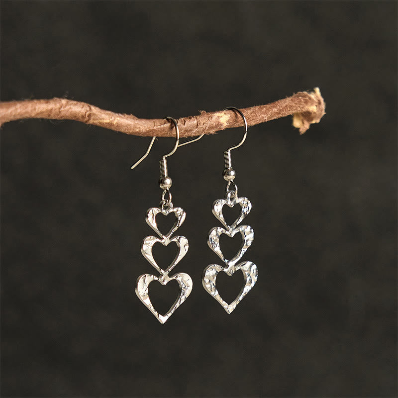 Boucles d'oreilles élégantes en acier titane avec Buddha Stones et marteau d'équilibre - image 14