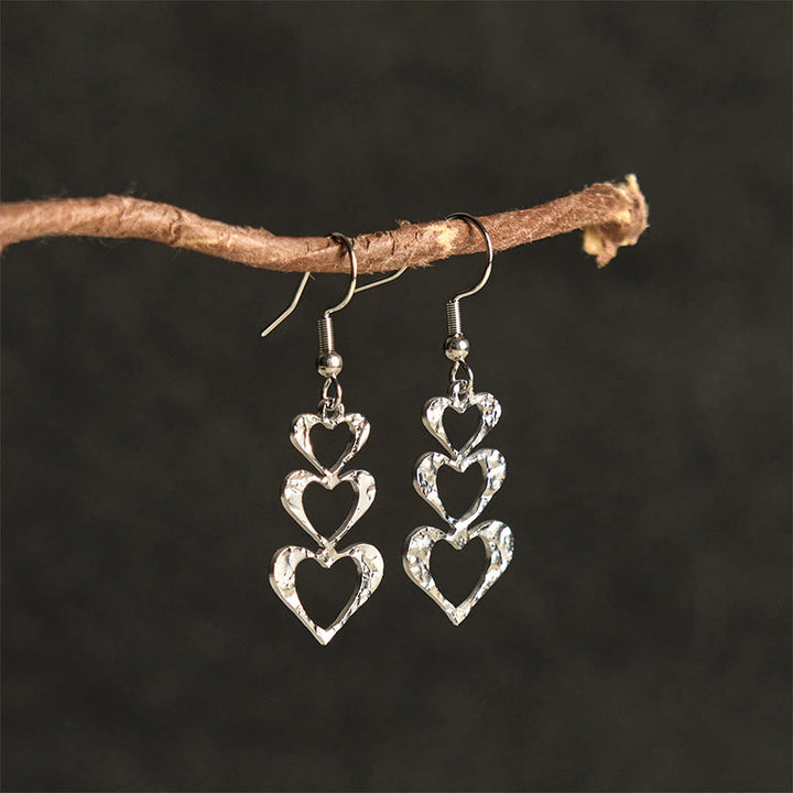 Boucles d'oreilles élégantes en acier titane avec Buddha Stones et marteau d'équilibre - image 14