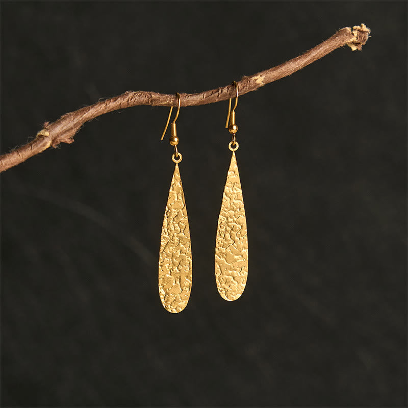Boucles d'oreilles élégantes en acier titane avec Buddha Stones et marteau d'équilibre - image 1