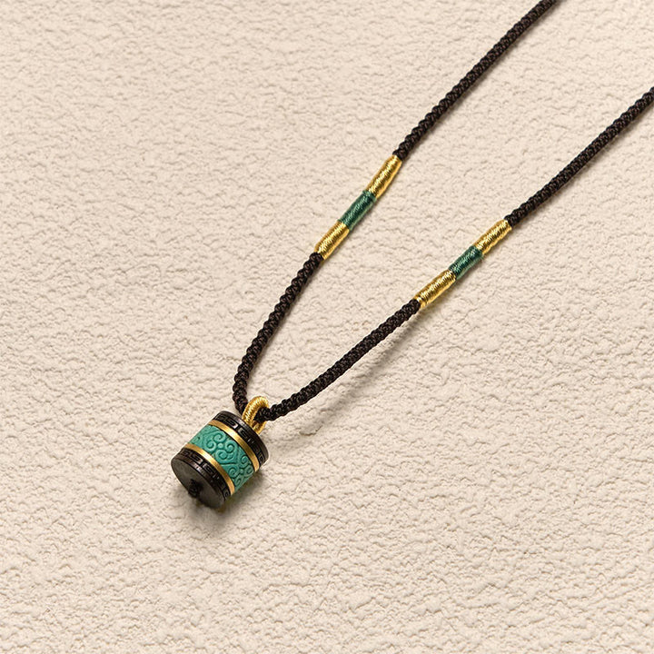 Collier pendentif cylindre de paix en bois d'ébène turquoise et Buddha Stones - image 3