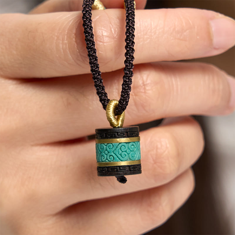 Collier pendentif cylindre de paix en bois d'ébène turquoise et Buddha Stones - Bois d'ébène - image 0