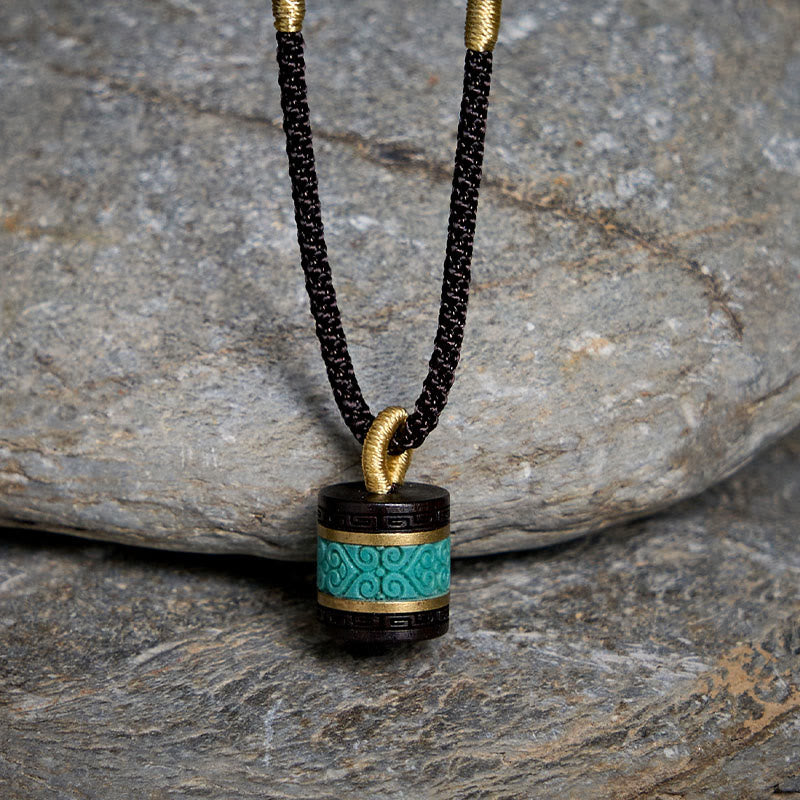 Collier pendentif cylindre de paix en bois d'ébène turquoise et Buddha Stones - image 1