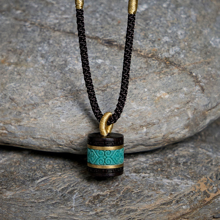 Collier pendentif cylindre de paix en bois d'ébène turquoise et Buddha Stones - image 1