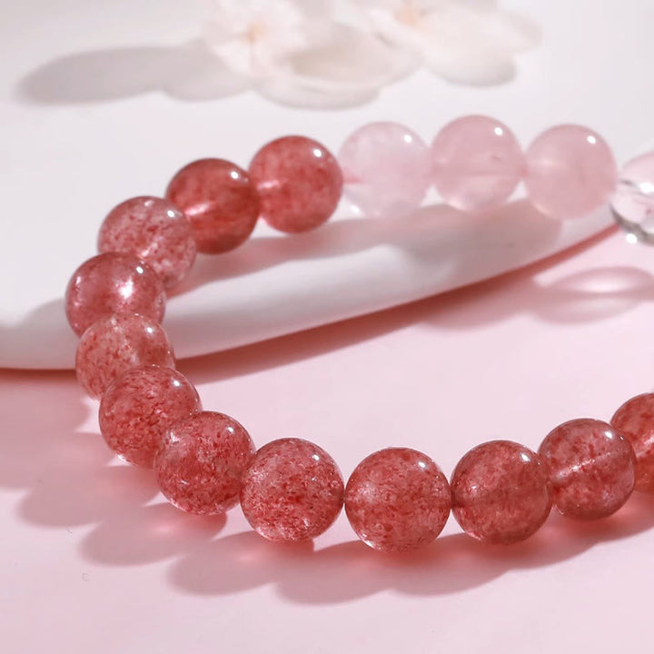 Bracelet porte-bonheur en Buddha Stones , quartz rose et quartz fraise - image 20