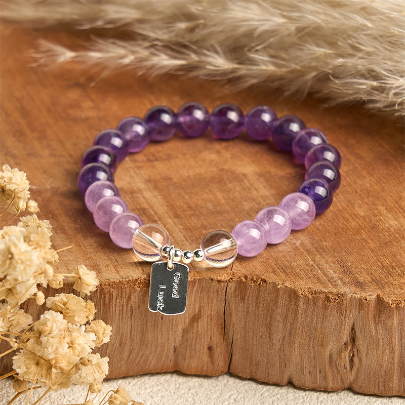 Bracelet porte-bonheur en Buddha Stones , quartz rose et quartz fraise - image 1