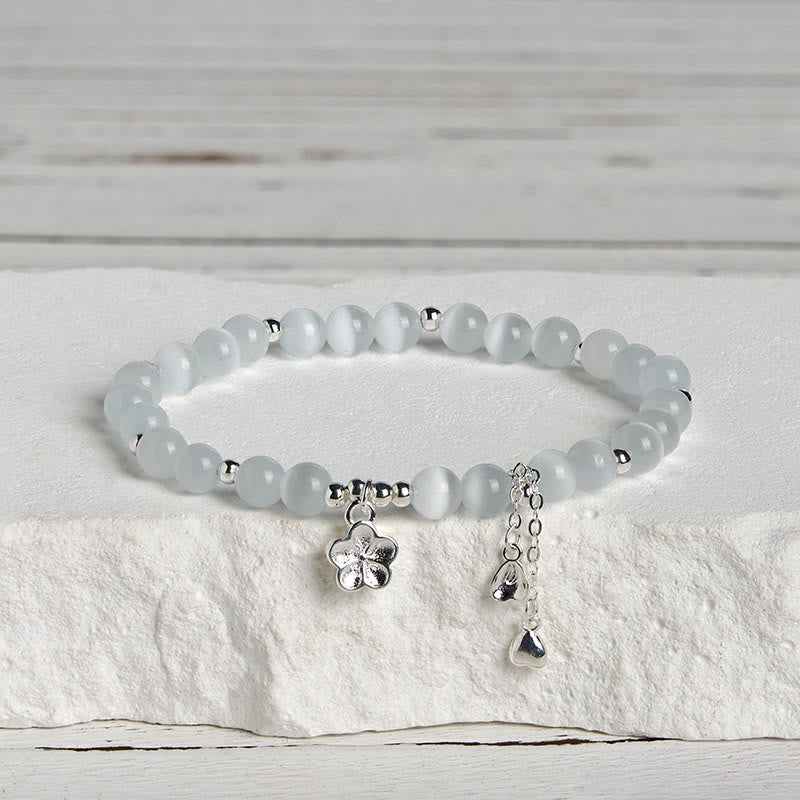 Bracelet de paix en œil de chat et fleurs de cerisier en Buddha Stones - image 2
