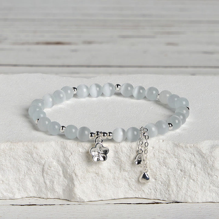 Bracelet de paix en œil de chat et fleurs de cerisier en Buddha Stones - image 2