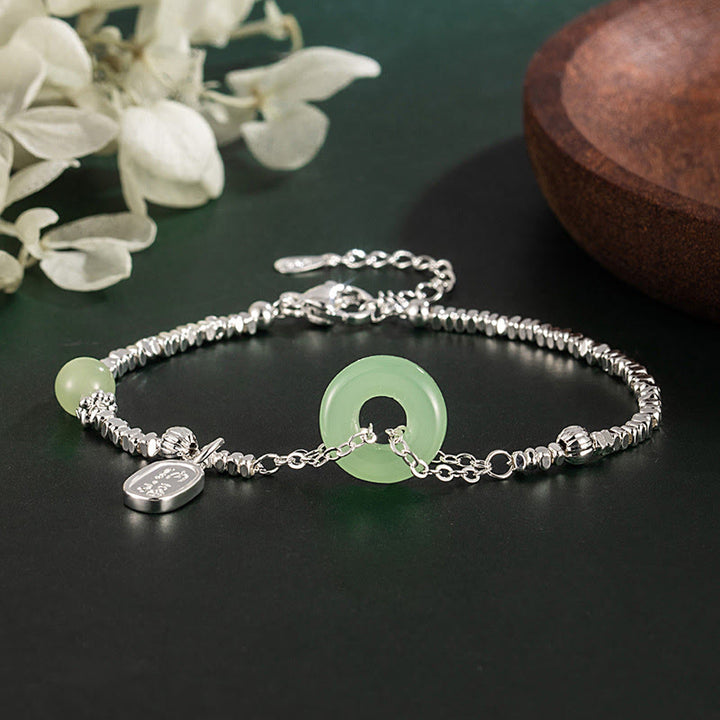 Bracelet porte-bonheur avec boucle de paix et symbole Fu en argent plaqué cuivre et Buddha Stones - Boucle de paix verte (tour de poignet : 15-17 cm) - image 0