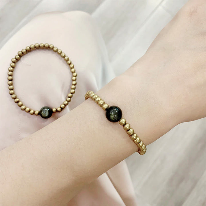 Bracelet de protection et de richesse en obsidienne plaqué cuivre et laiton doré avec Buddha Stones - image 2