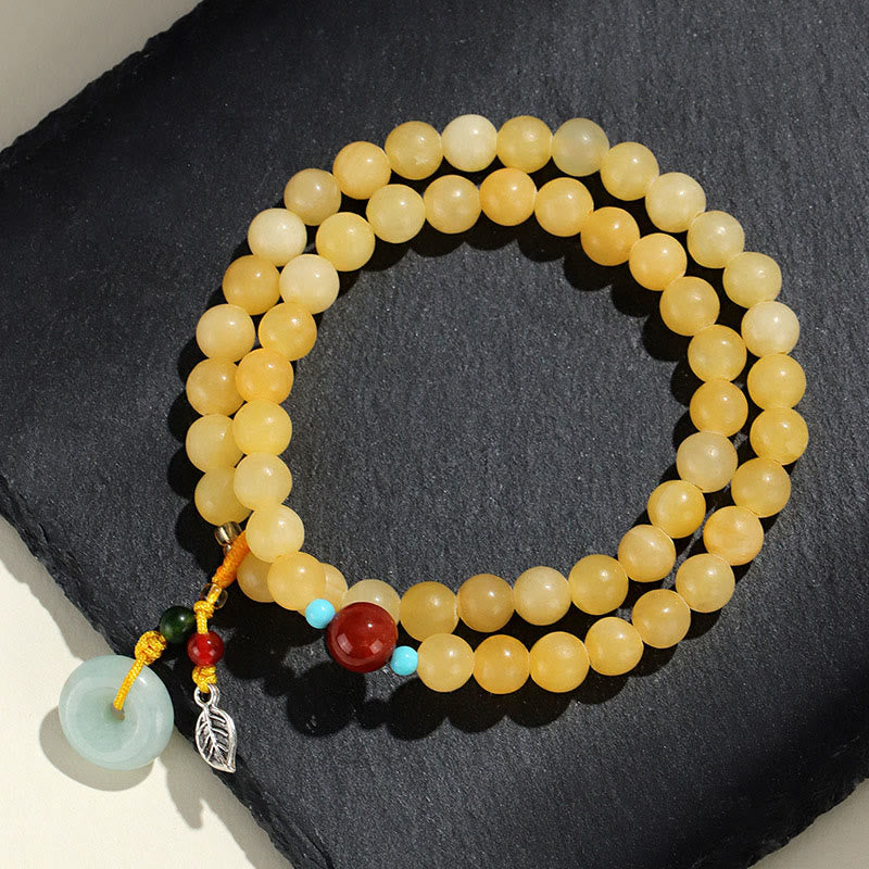 Bracelet de richesse à double tour avec boucle de paix en topaze et Buddha Stones - image 1