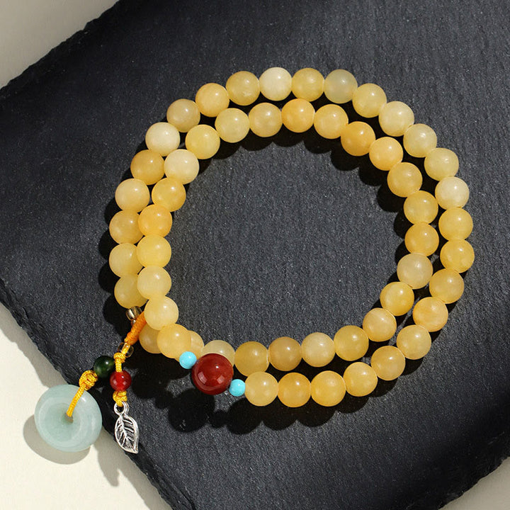 Bracelet de richesse à double tour avec boucle de paix en topaze et Buddha Stones - image 1