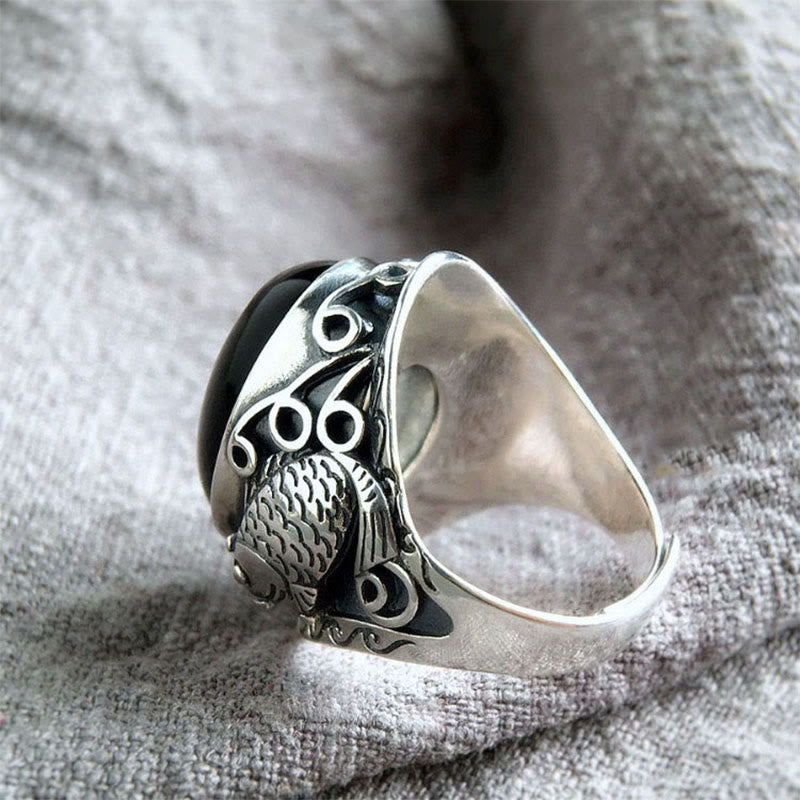 Bague ajustable en Buddha Stones noire avec symbole de force du poisson koï - image 1