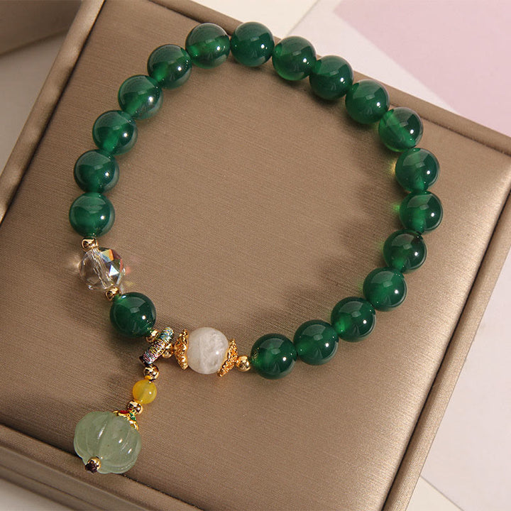 Bracelet relaxant et calme en perles de citrouille en cristal vert Buddha Stones - image 3
