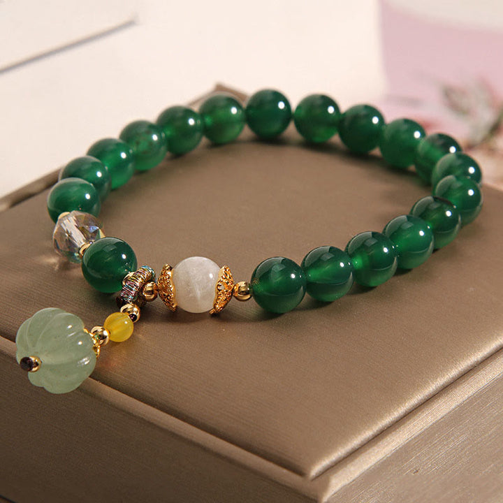 Bracelet relaxant et calme en perles de citrouille en cristal vert Buddha Stones - image 1
