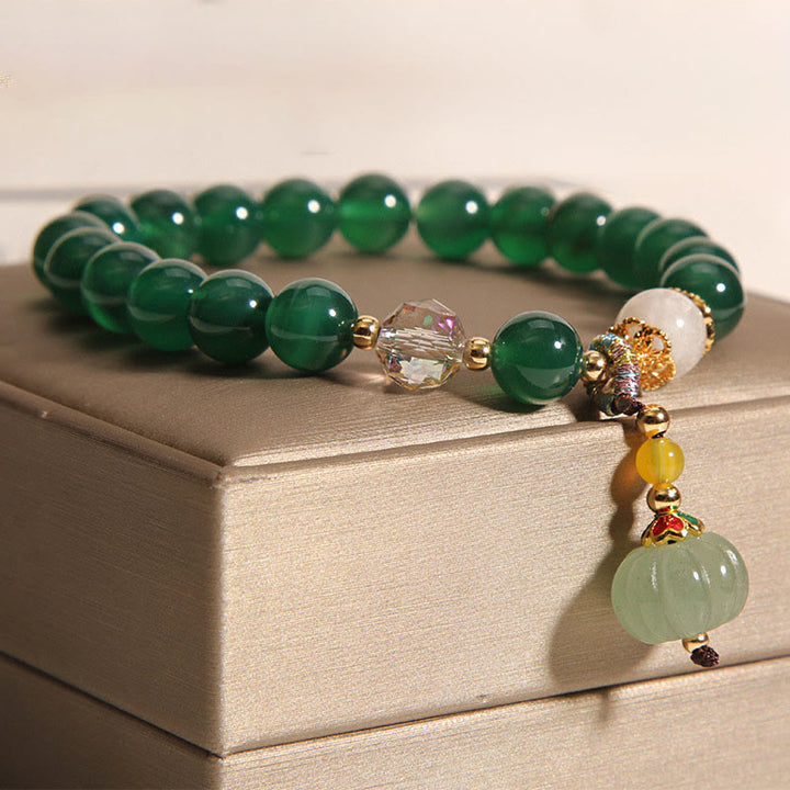 Bracelet relaxant et calme en perles de citrouille en cristal vert Buddha Stones - image 2