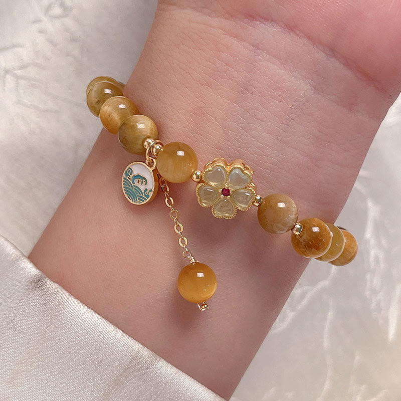 Bracelet courage en forme de clochette et œil de tigre doré naturel Buddha Stones - image 7