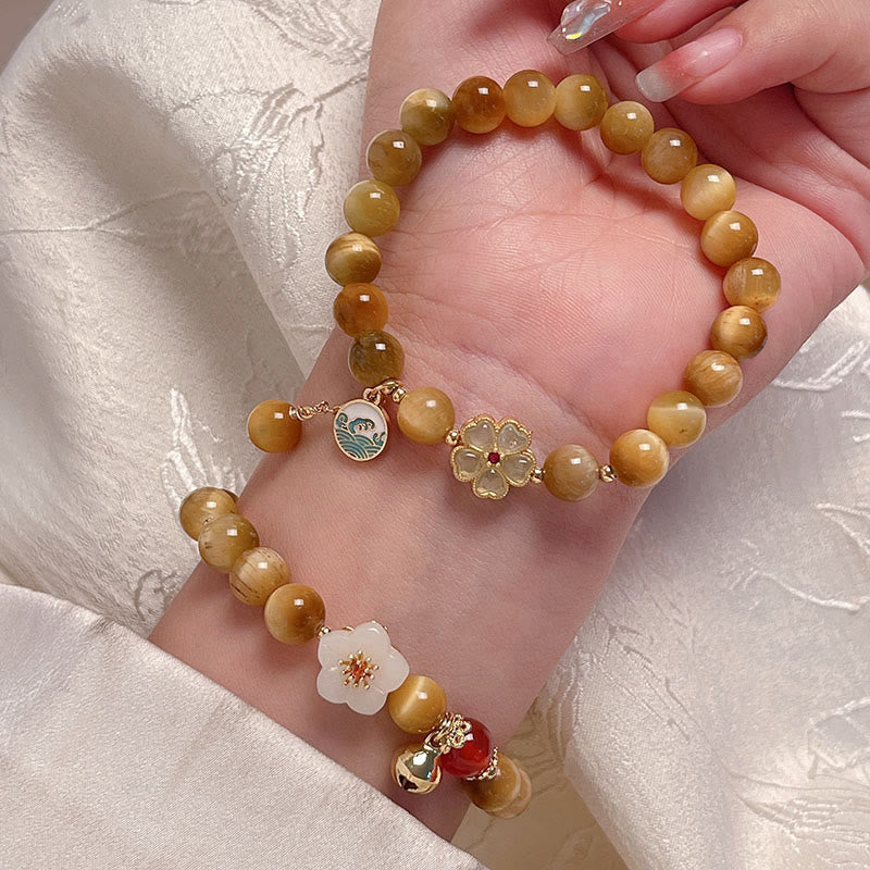 Bracelet courage en forme de clochette et œil de tigre doré naturel Buddha Stones - image 11