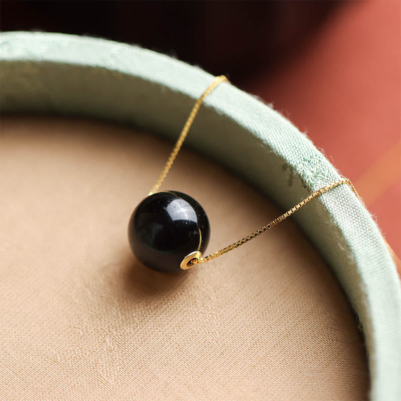 Collier avec pendentif en argent sterling 925 et perles rondes d'ambre Buddha Stones, symbole de confiance et de concentration - image 1