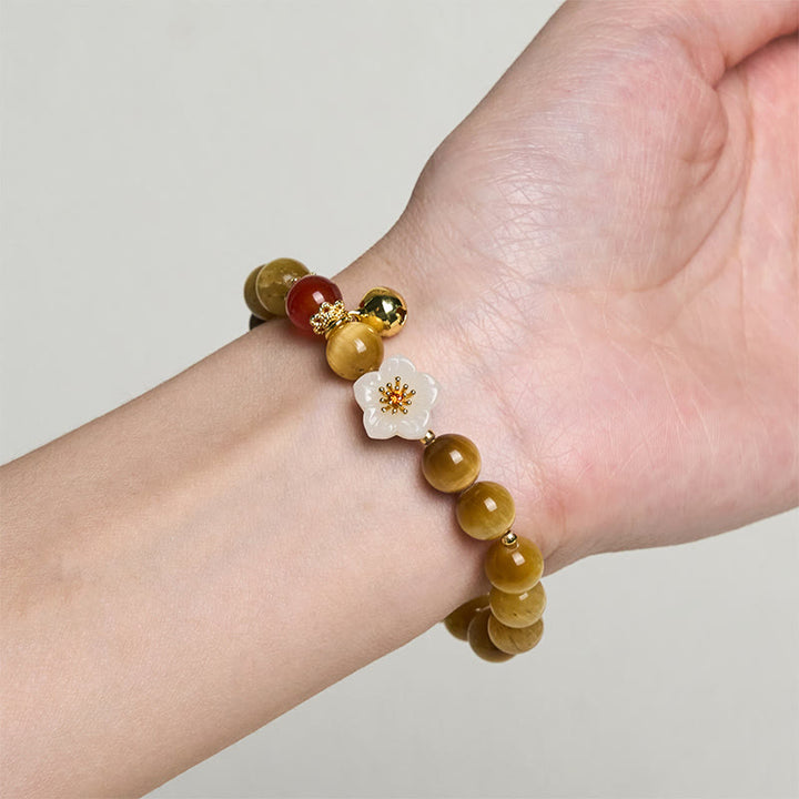 Bracelet courage en forme de clochette et œil de tigre doré naturel Buddha Stones - image 3
